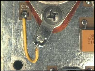 white wire connected to solder lug